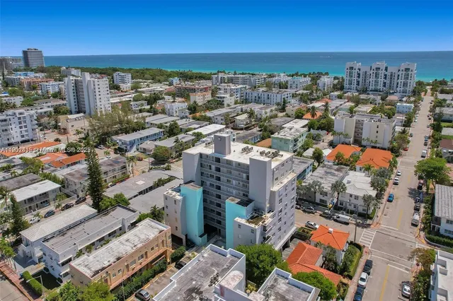 an aerial view of residential building with outdoor space
