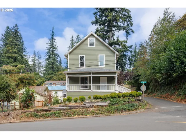 a house with trees in the background