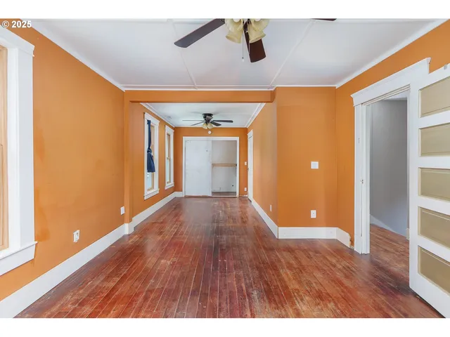 a bathroom with a shower a toilet and a shower