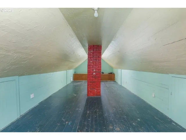 a view of entryway with stairs