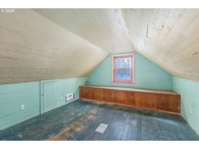 a utility room with closet dryer and washer