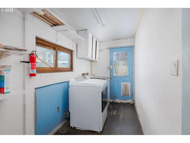 a aerial view of a house with a yard balcony