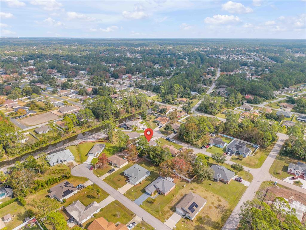 7 Ranbay Place Palm Coast, FL 32164 - Photo 66 of 76 an aerial view of residential building with parking space
