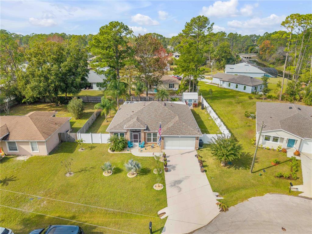7 Ranbay Place Palm Coast, FL 32164 - Photo 71 of 76 an aerial view of residential houses with outdoor space and swimming pool