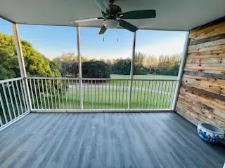 a view of a balcony with a swimming pool