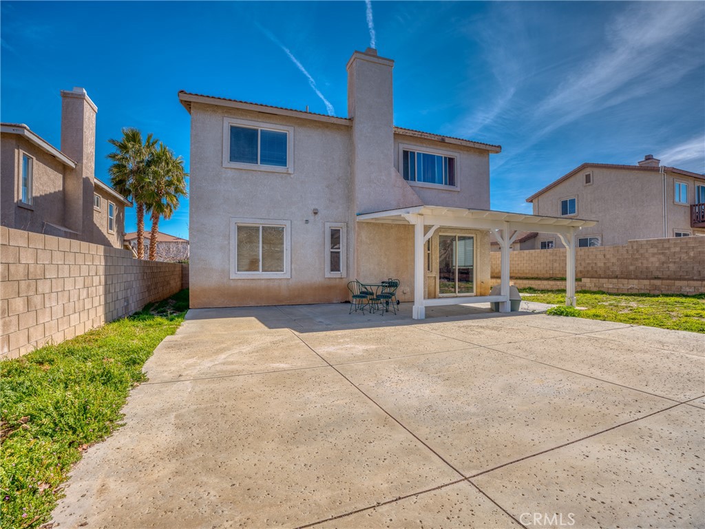 39233 Chantilly Lane Palmdale, CA 93551 - Photo 30 of 31 a house view with a outdoor space