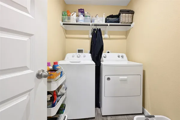 a utility room with dryer and washer