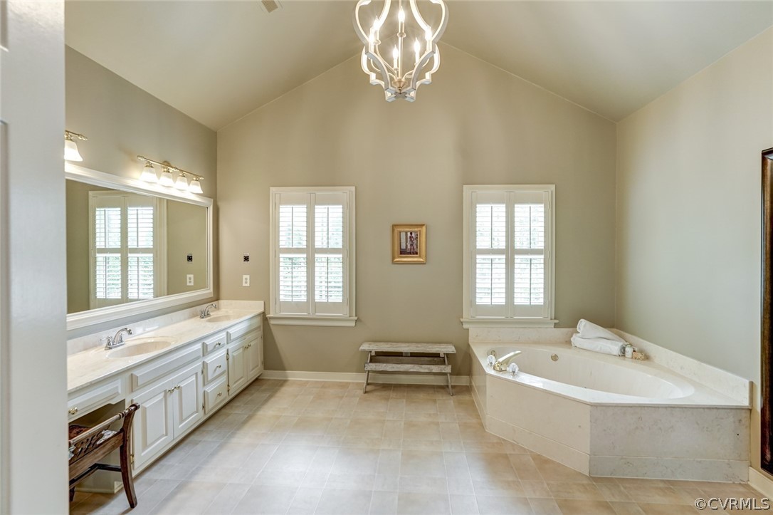3970 Reeds Landing Circle Midlothian, VA 23113 - Photo 30 of 48 a spacious bathroom with a tub sink and mirror