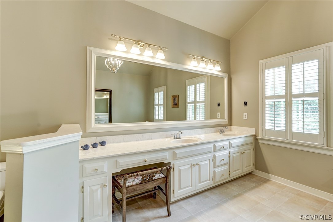 3970 Reeds Landing Circle Midlothian, VA 23113 - Photo 32 of 48 a spacious bathroom with a sink a large mirror and a bathtub