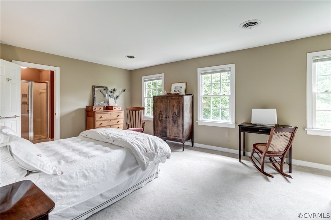 3970 Reeds Landing Circle Midlothian, VA 23113 - Photo 35 of 48 a bedroom with a bed and a dresser in it