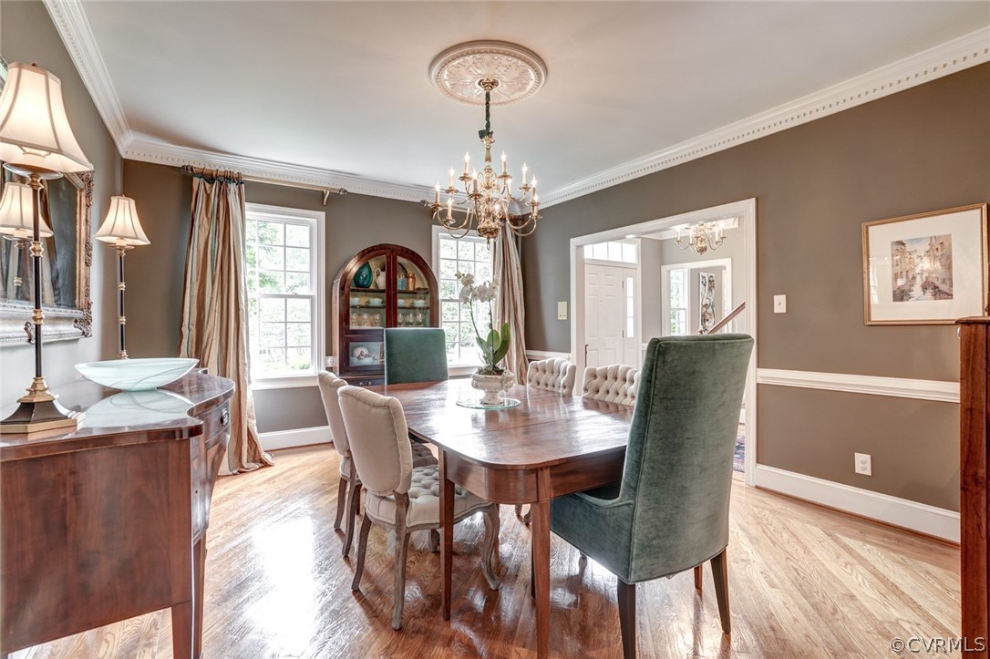 3970 Reeds Landing Circle Midlothian, VA 23113 - Photo 7 of 48 a view of a dining room with furniture and chandelier