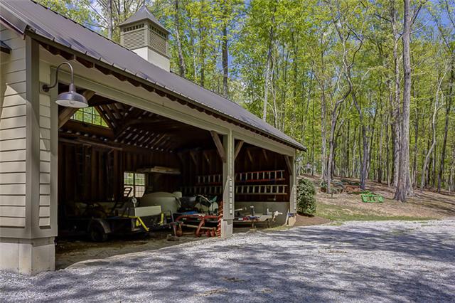 2890 Webb Hollow Road Williamsport, TN 38487 - Photo 11 of 20 The storage shed is designed with an open front to house tractors, ATV’s and other tools and equipment.