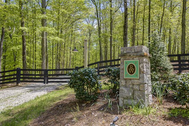 2890 Webb Hollow Road Williamsport, TN 38487 - Photo 4 of 20 Black 4-board fencing interspersed with rock columns announce a special property as you turn onto Webb Hollow Road. A separate construction entrance and five additional gates along the .5 mile road frontage assure convenient access to the property.