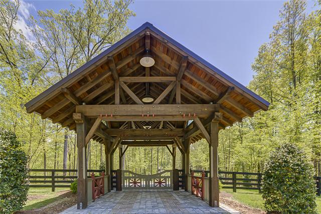2890 Webb Hollow Road Williamsport, TN 38487 - Photo 5 of 20 The Gate House, constructed with heavy timber and commercial grade metal roof, features 2 cupolas. Water and lights are connected to the structure.
