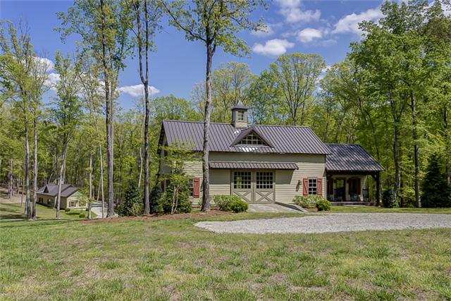 2890 Webb Hollow Road Williamsport, TN 38487 - Photo 6 of 20 The Dutch Style Barn with shop is constructed with heavy timber and Hardi board siding. Note the commercial grade, standing seam roof with cupola. The barn is insulated and ready to convert to a charming cottage.