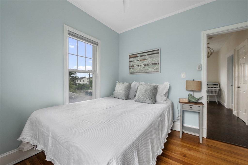 21 Little Nahant Road Nahant, MA 01908 - Photo 24 of 35 a bedroom with bed and a window