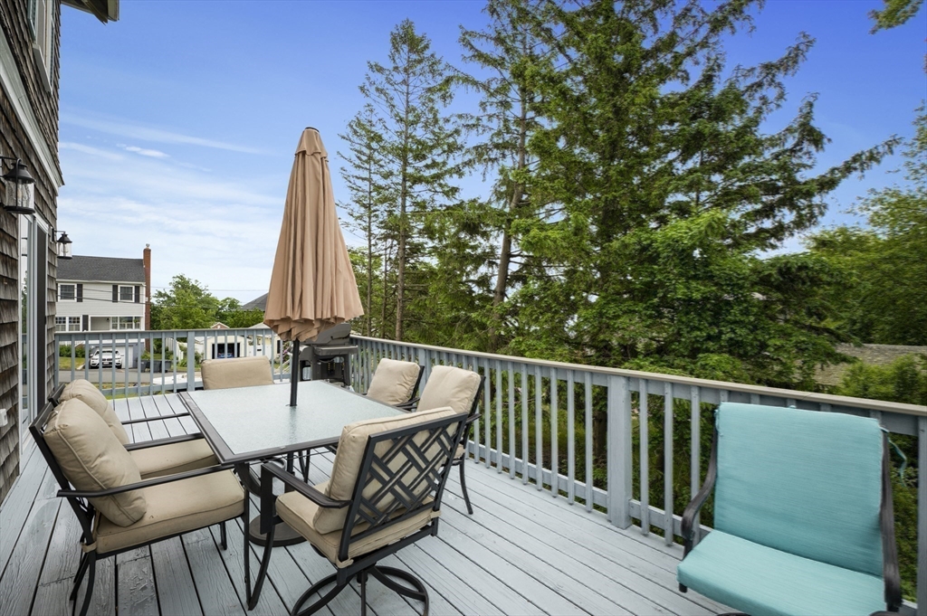 21 Little Nahant Road Nahant, MA 01908 - Photo 29 of 35 a view of deck with furniture and trees