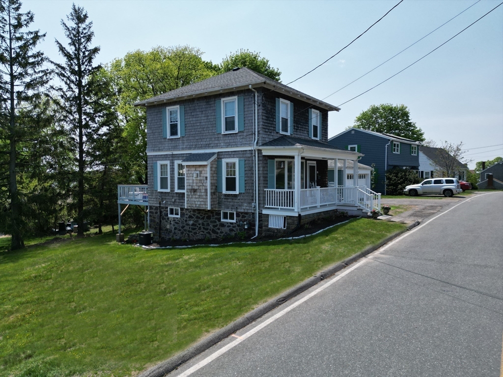 21 Little Nahant Road Nahant, MA 01908 - Photo 5 of 35 a view of a house with a yard