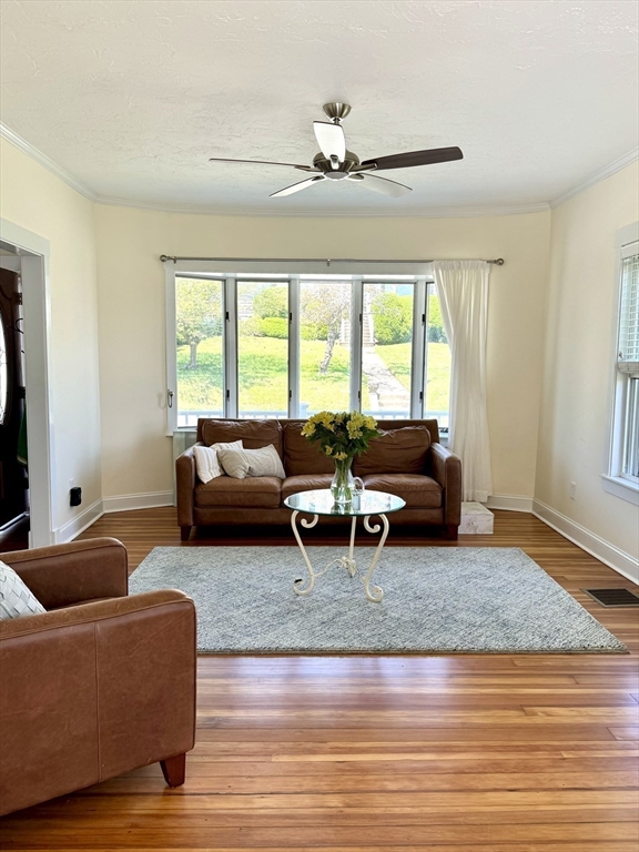 21 Little Nahant Road Nahant, MA 01908 - Photo 7 of 35 a living room with furniture and a large window