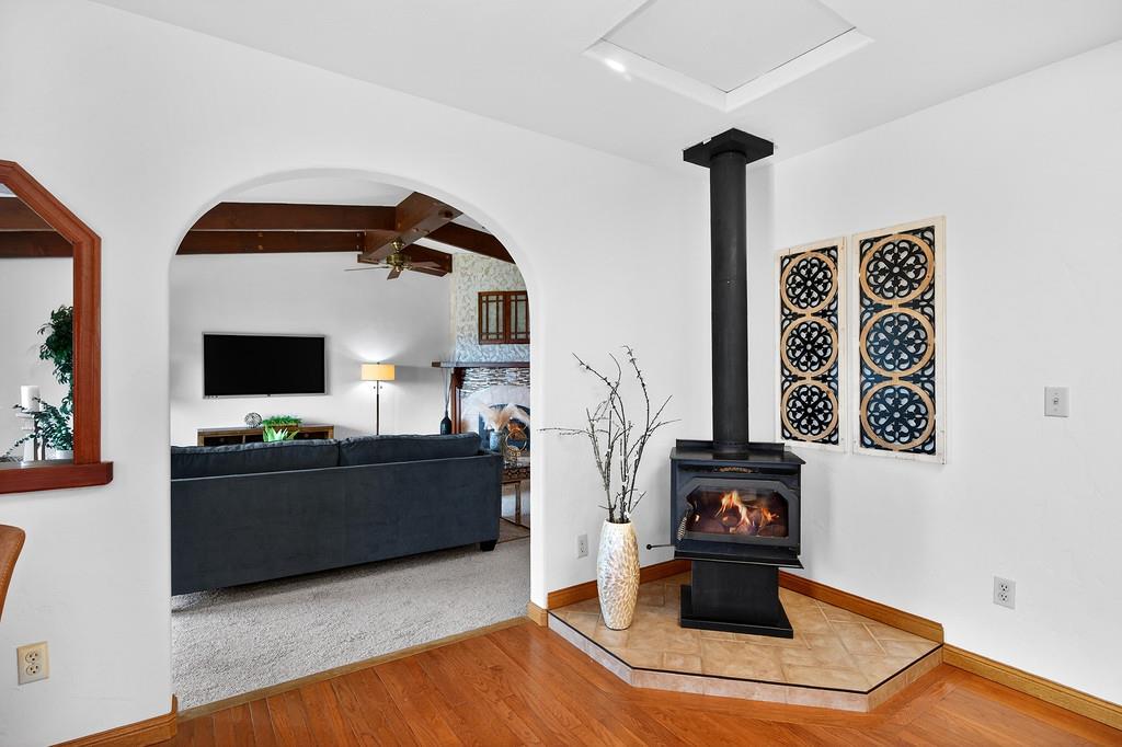 7730 McCourtney Road Lincoln, CA 95648 - Photo 14 of 99 a living room with furniture and a flat screen tv