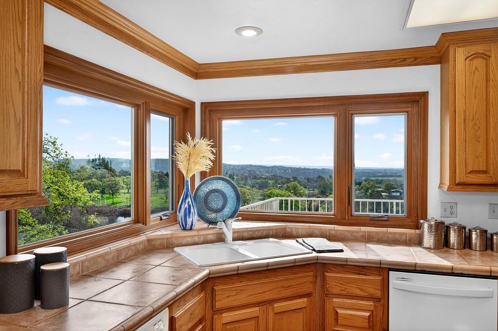 7730 McCourtney Road Lincoln, CA 95648 - Photo 27 of 99 a kitchen with a sink and a large window
