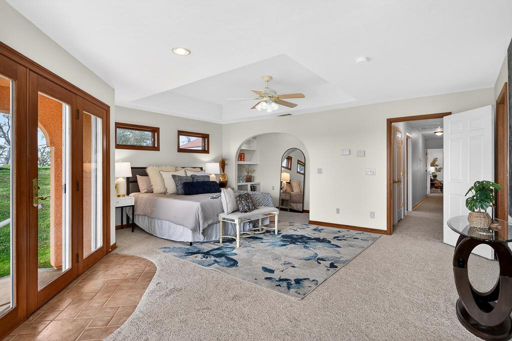 7730 McCourtney Road Lincoln, CA 95648 - Photo 39 of 99 a living room with furniture a dining table and a large window