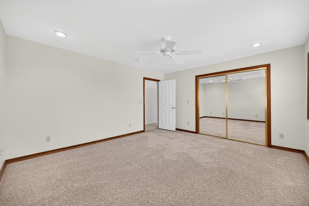 7730 McCourtney Road Lincoln, CA 95648 - Photo 43 of 99 an empty room with a ceiling fan