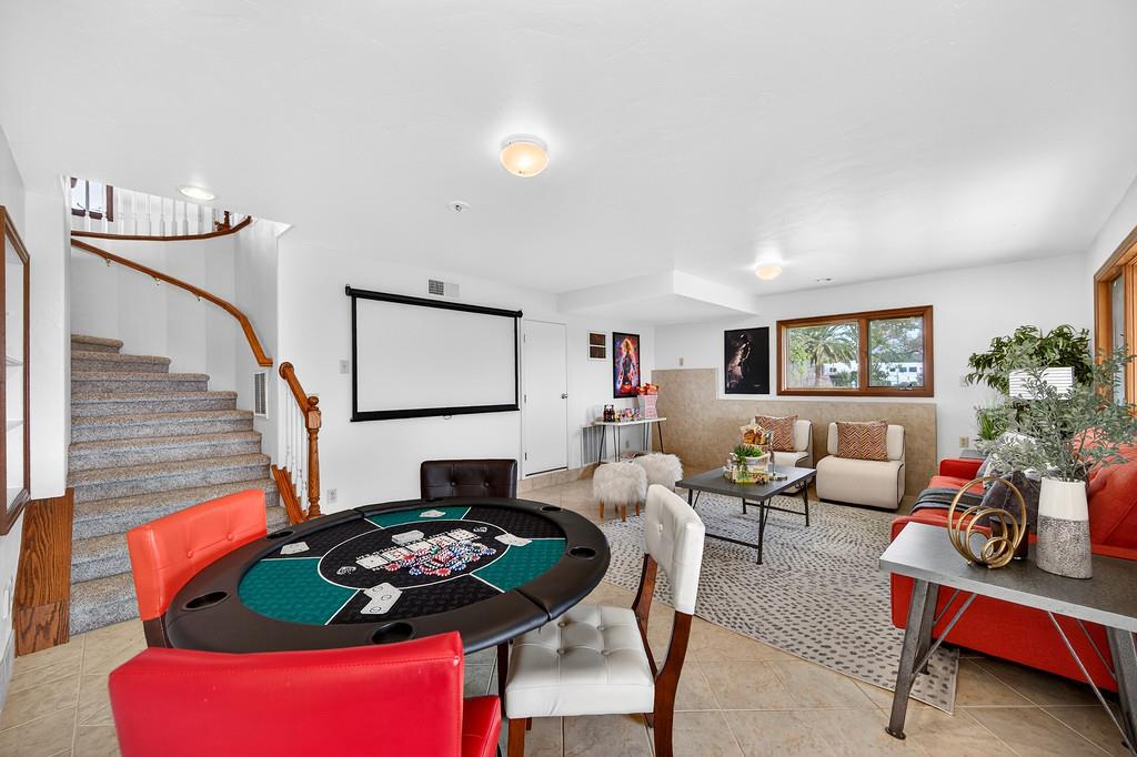 7730 McCourtney Road Lincoln, CA 95648 - Photo 49 of 99 a living room with furniture and a wooden floor