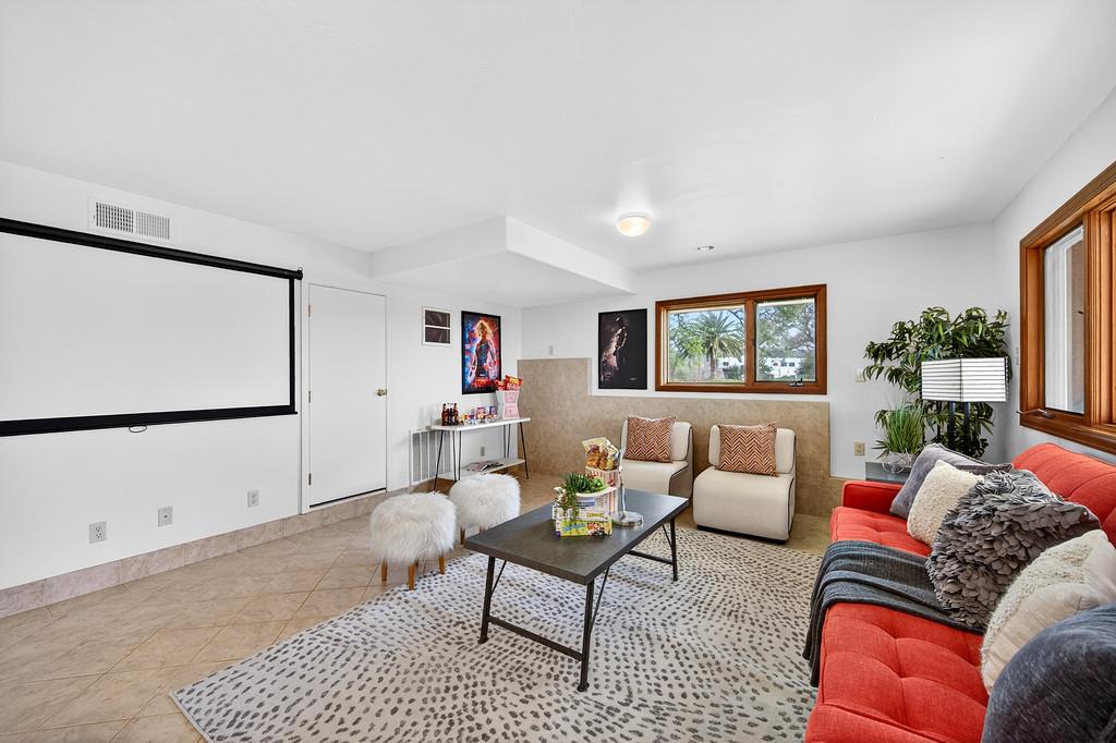 7730 McCourtney Road Lincoln, CA 95648 - Photo 50 of 99 a living room with furniture and a window