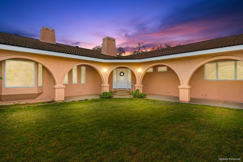 7730 McCourtney Road Lincoln, CA 95648 - Photo 7 of 99 a front view of a house with garden