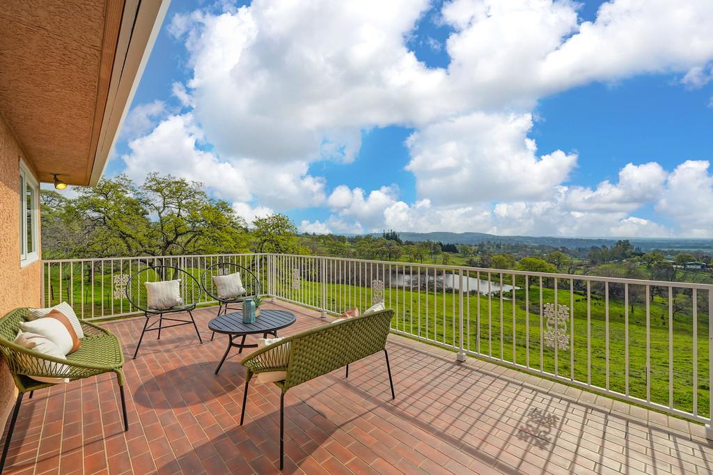 7730 McCourtney Road Lincoln, CA 95648 - Photo 86 of 99 a view of a balcony with two chairs and a table