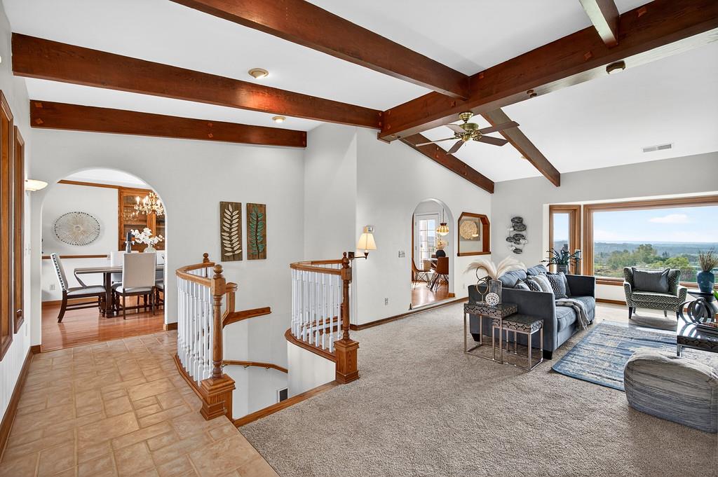 7730 McCourtney Road Lincoln, CA 95648 - Photo 10 of 99 a living room with furniture and a dining table