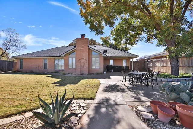 a view of a house with a patio