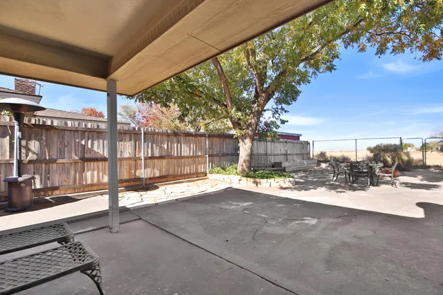 a view of a terrace with tree s