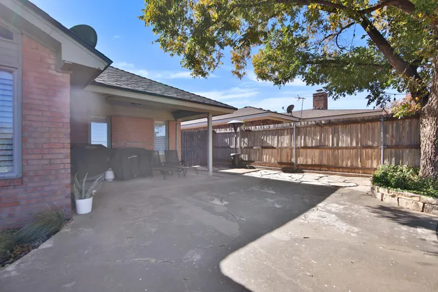 a view of a back yard of the house