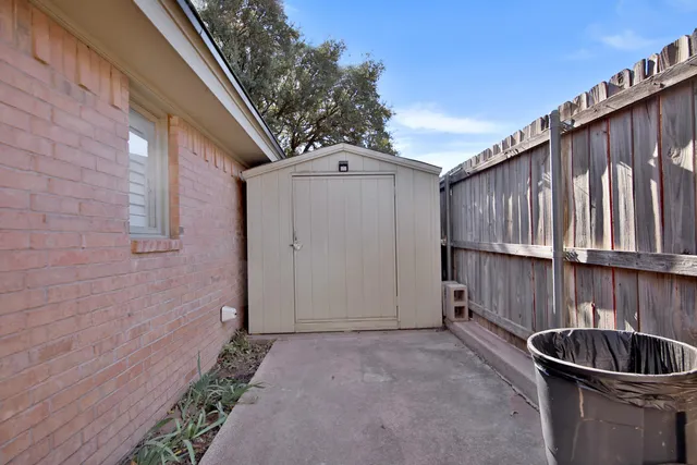 a view of outdoor space and deck in the backyard