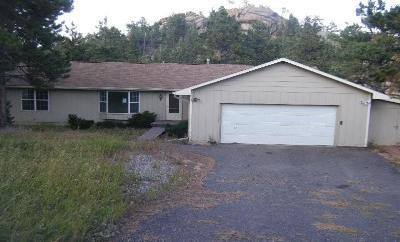 31400 Hilltop Road Golden, CO 80403 - Photo 1 of 1 a view of a house with a outdoor space