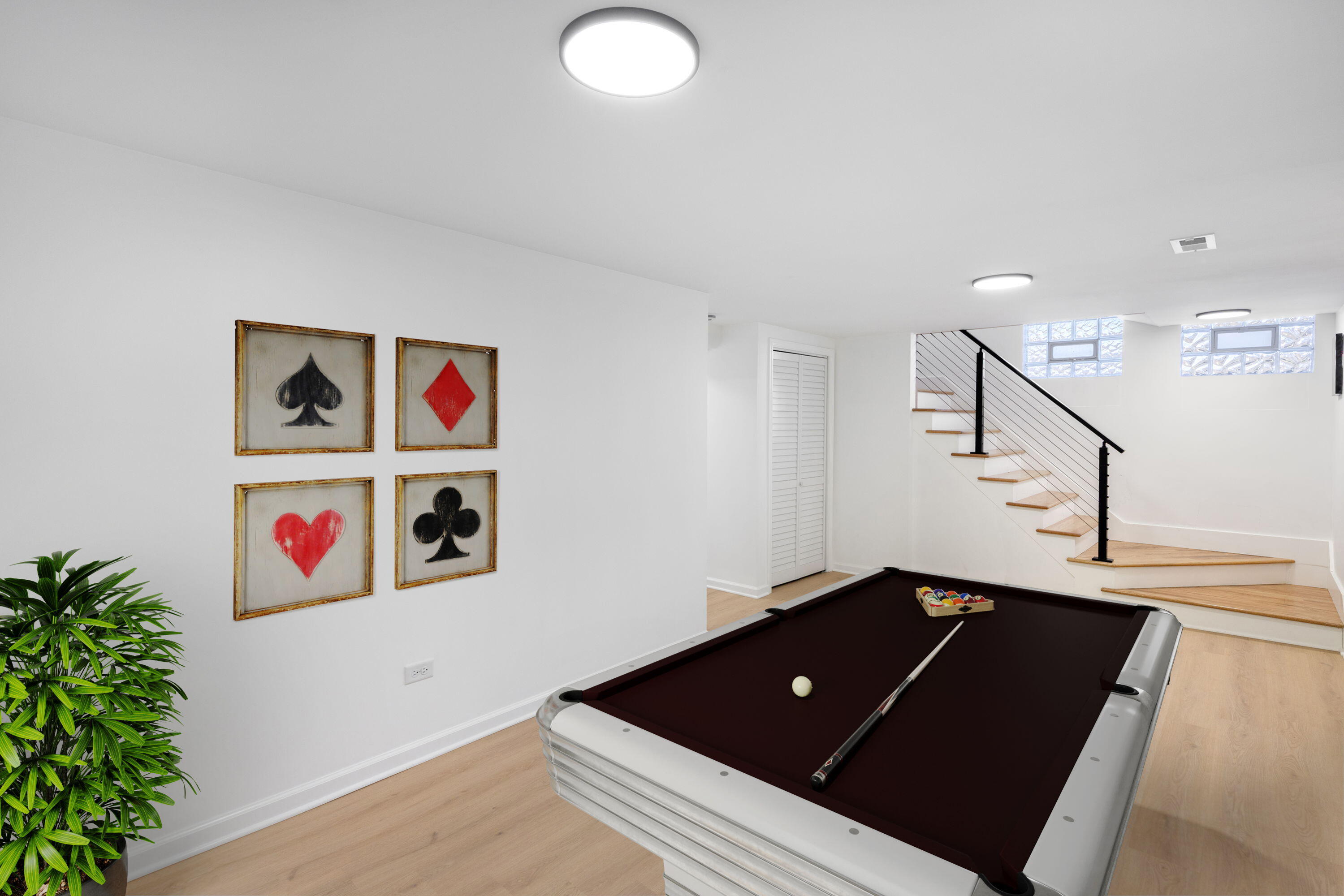 419 Cleveland Street Gary, IN 46404 - Photo 30 of 42 a view of an empty room with stairs and toys