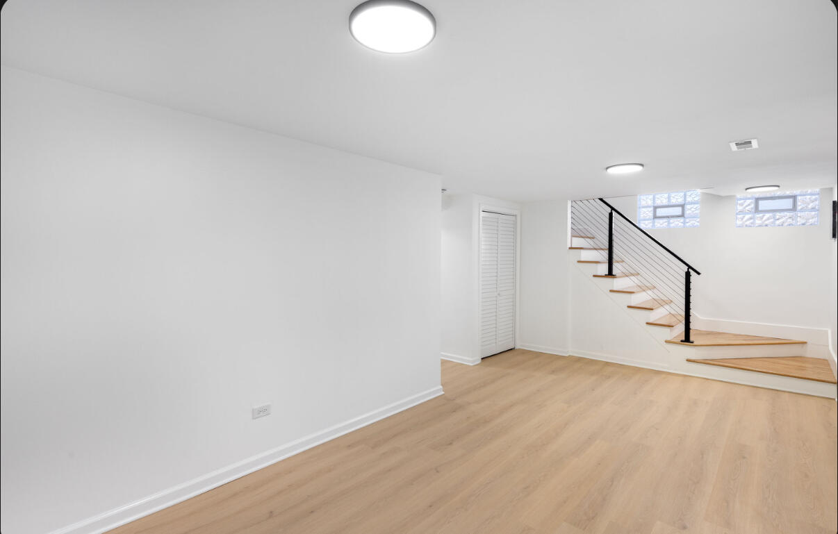 419 Cleveland Street Gary, IN 46404 - Photo 31 of 42 a view of an empty room with stairs
