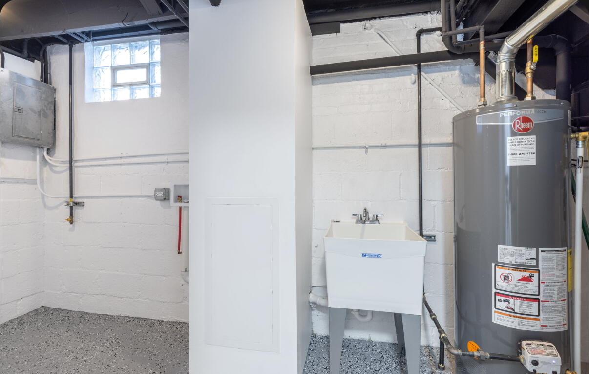 419 Cleveland Street Gary, IN 46404 - Photo 37 of 42 a bathroom with a shower and a sink