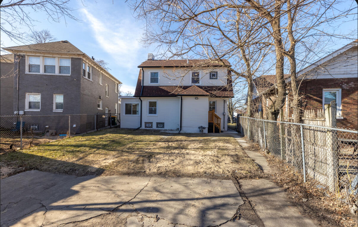 419 Cleveland Street Gary, IN 46404 - Photo 39 of 42 a front view of a house with a yard