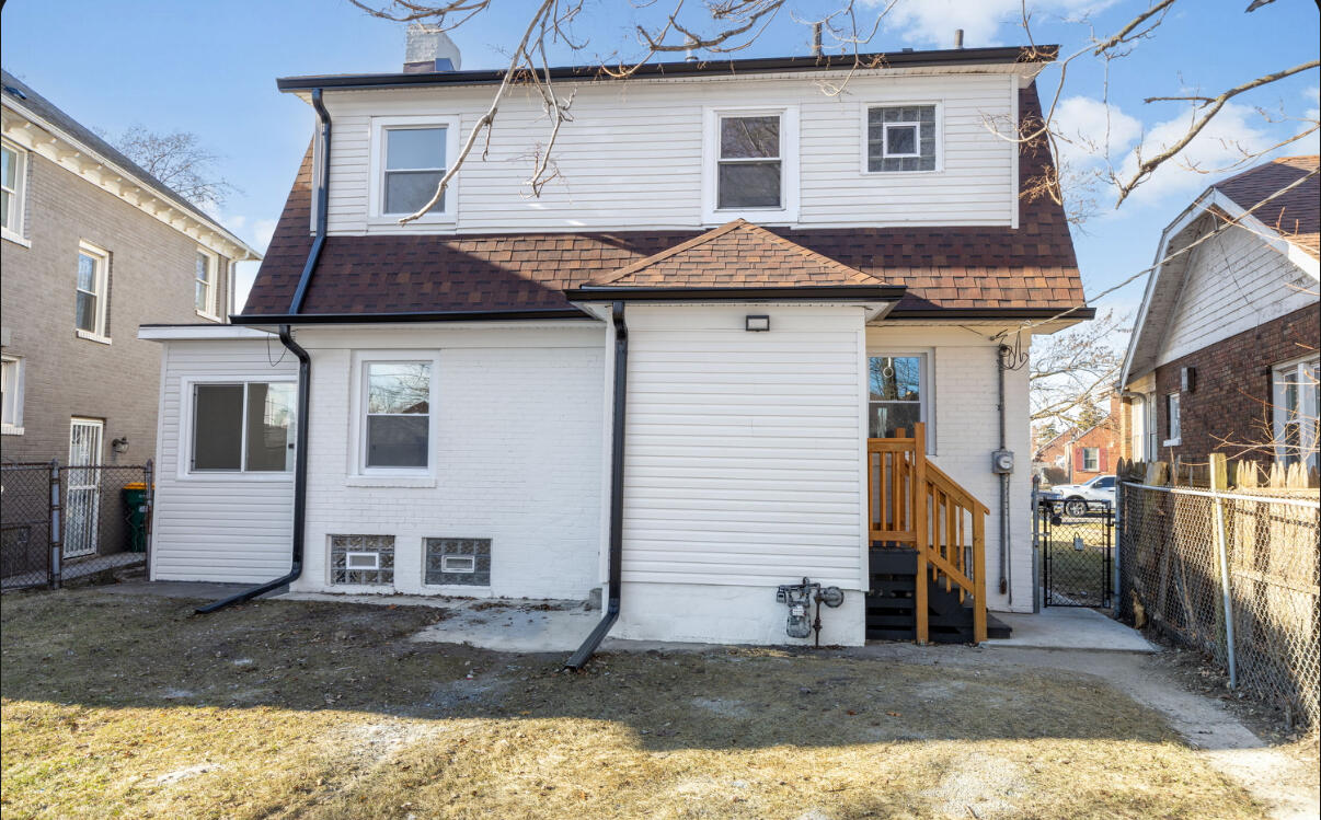 419 Cleveland Street Gary, IN 46404 - Photo 40 of 42 a view of a house with a yard