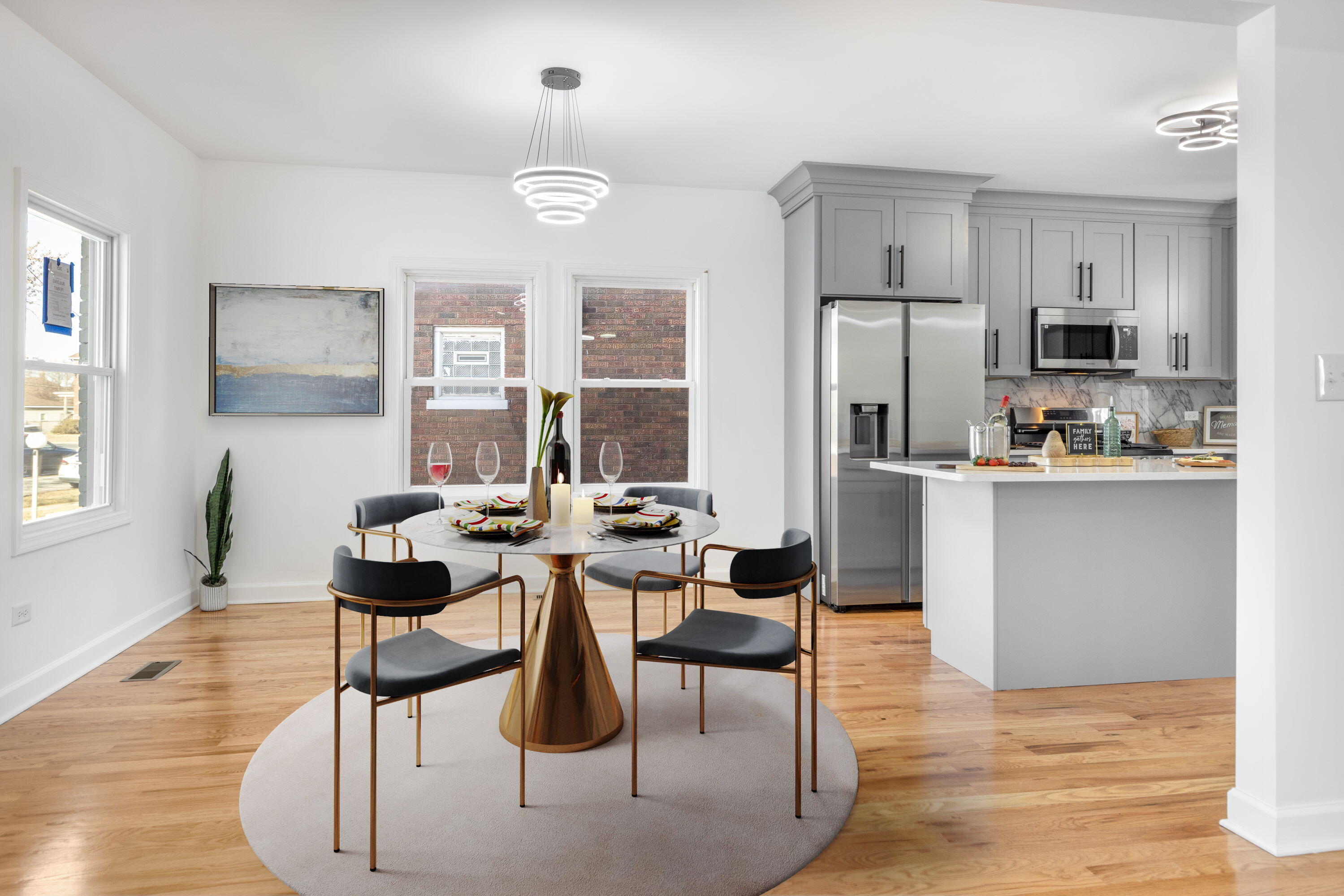 419 Cleveland Street Gary, IN 46404 - Photo 7 of 42 a living room with stainless steel appliances kitchen island granite countertop furniture and a fireplace