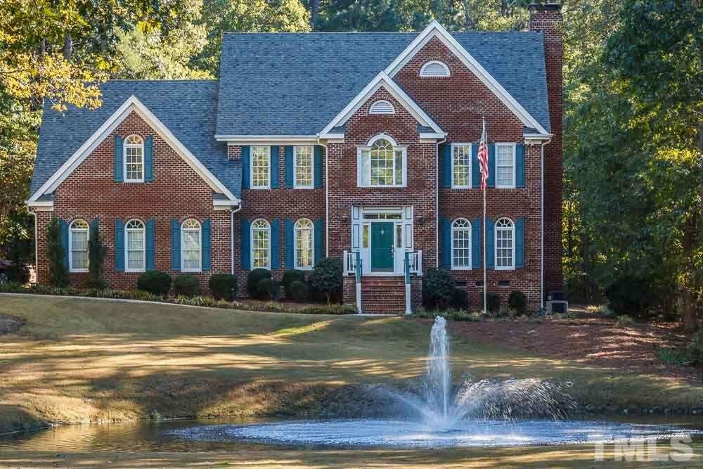 7525 Hazelhurst Circle Apex, NC 27502 - Photo 4 of 25 a front view of a house with a yard