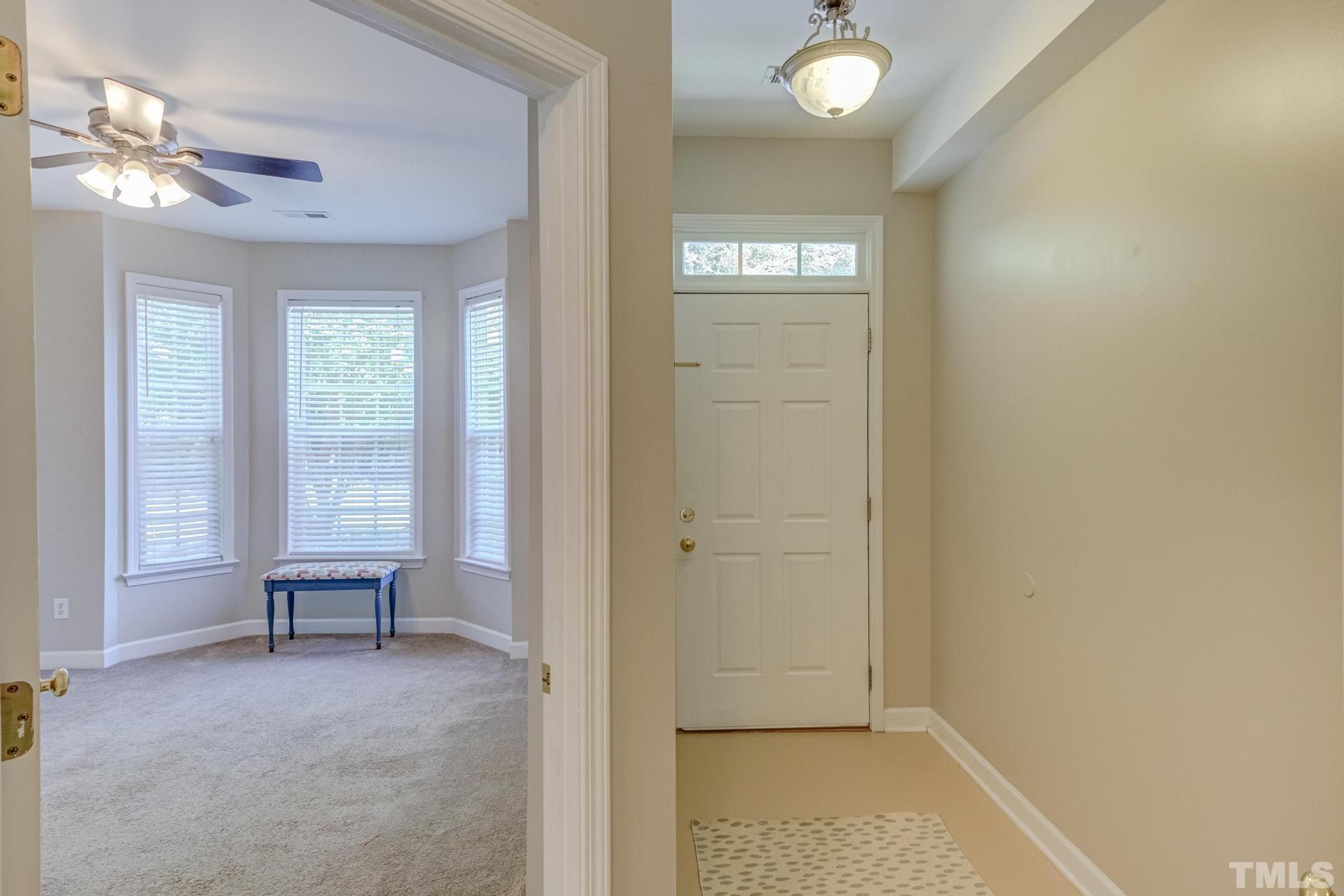 844 Horton Road, Unit 28 Durham, NC 27704 - Photo 3 of 22 a view of room with window and hardwood floor