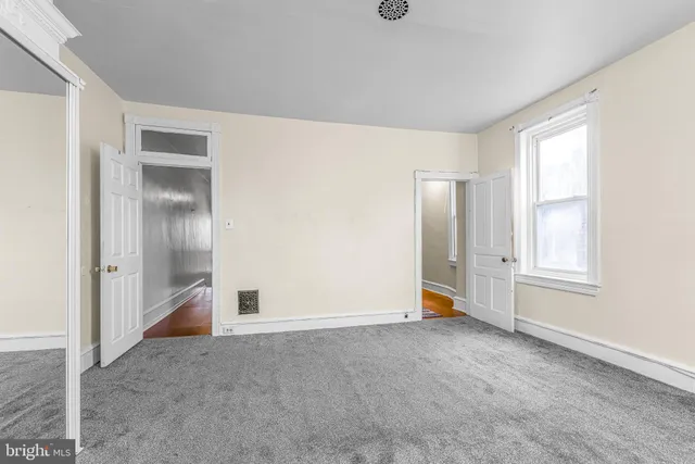 a view of an empty room with window