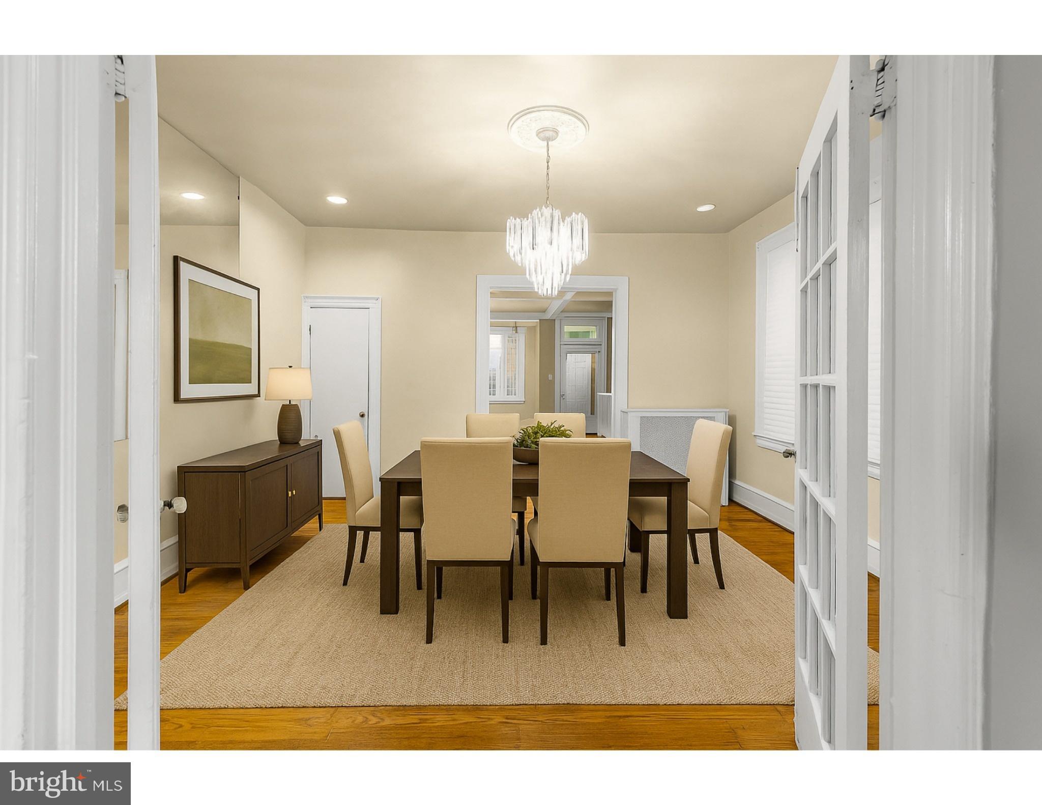 526 North 58th Street Philadelphia, PA 19131 - Photo 2 of 23 a view of a dining room with furniture and chandelier