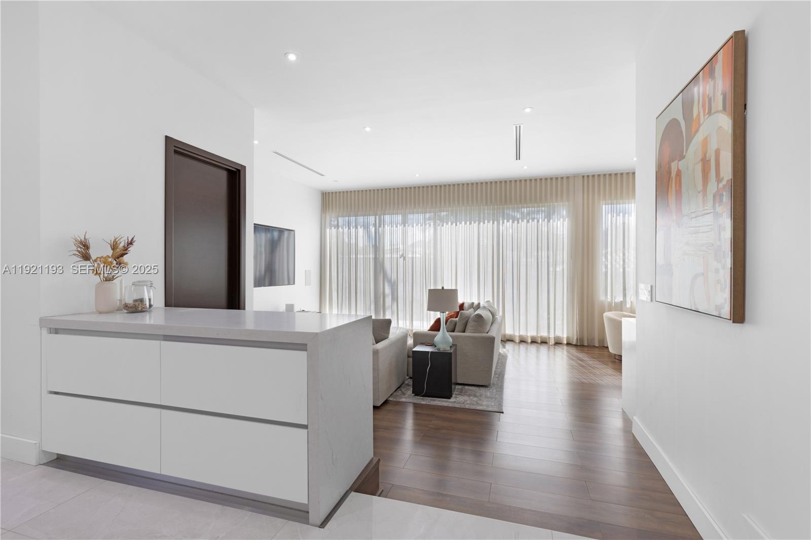 2420 Southwest 24th Street Miami, FL 33145 - Photo 20 of 53 a living room with furniture and wooden floor