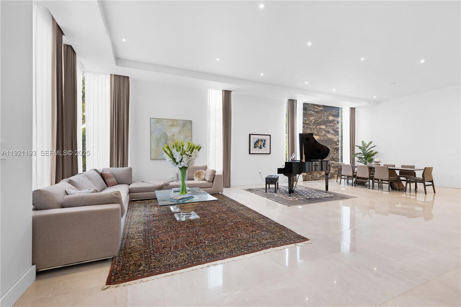 2420 Southwest 24th Street Miami, FL 33145 - Photo 3 of 53 a living room with furniture hard wood floor and a chandelier