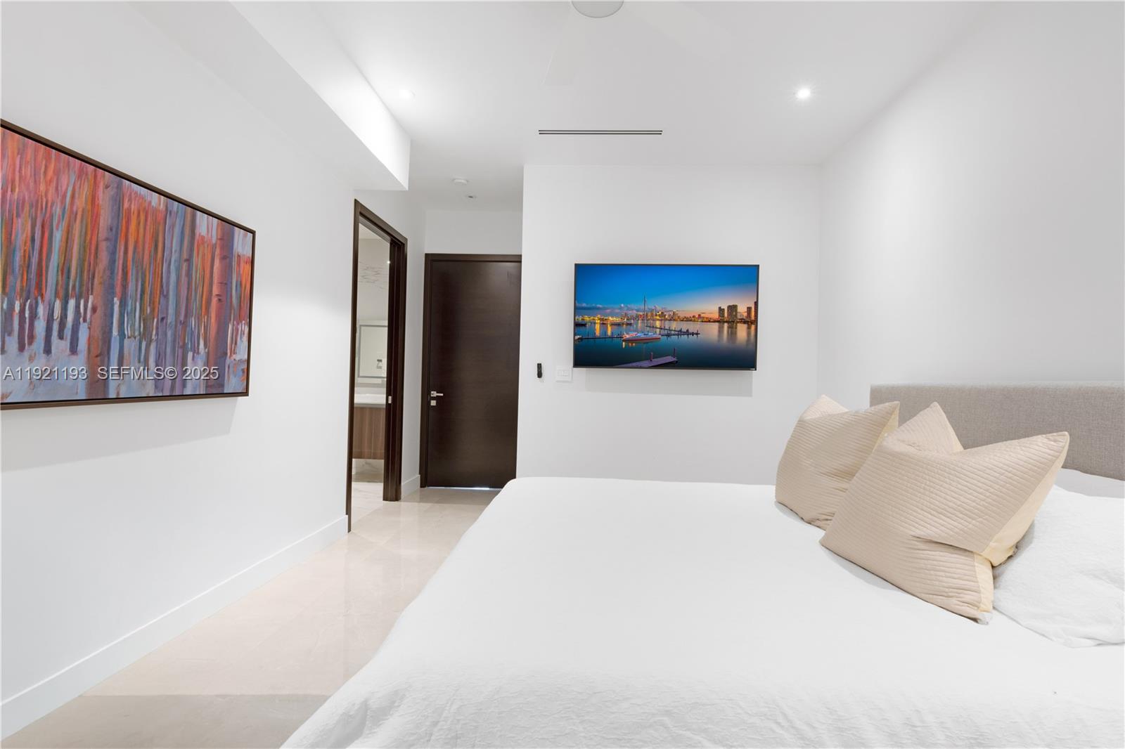 2420 Southwest 24th Street Miami, FL 33145 - Photo 37 of 53 a living room with furniture and a flat screen tv